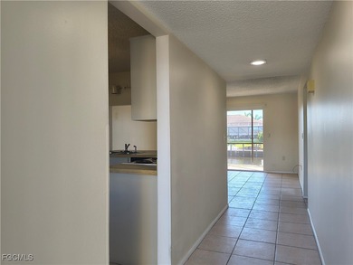 Welcome to 1335 Mineo Dr., Unit C, a cute waterfront condo just on Saint Andrews South Golf Club in Florida - for sale on GolfHomes.com, golf home, golf lot