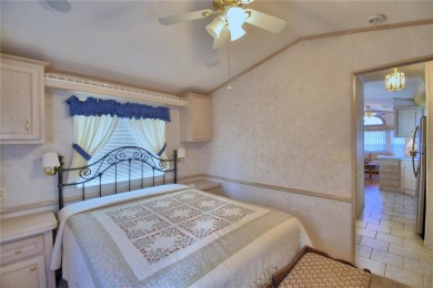 WELCOME TO YOUR FLORIDA RETIREMENT OASIS IN A GATED/GOLF CART on Southern Dunes Golf and Country Club in Florida - for sale on GolfHomes.com, golf home, golf lot