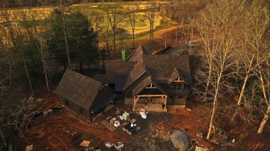Exceptional 5-bedroom stone and cedar shake home with on Old Toccoa Farm Golf Club in Georgia - for sale on GolfHomes.com, golf home, golf lot