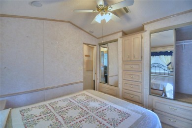 WELCOME TO YOUR FLORIDA RETIREMENT OASIS IN A GATED/GOLF CART on Southern Dunes Golf and Country Club in Florida - for sale on GolfHomes.com, golf home, golf lot
