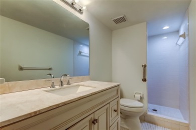 PRICED TO SELL!   This FIRST FLOOR condo located in desirable on East Lake Woodlands Country Club in Florida - for sale on GolfHomes.com, golf home, golf lot