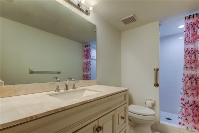 PRICED TO SELL!   This FIRST FLOOR condo located in desirable on East Lake Woodlands Country Club in Florida - for sale on GolfHomes.com, golf home, golf lot