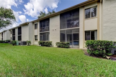 PRICED TO SELL!   This FIRST FLOOR condo located in desirable on East Lake Woodlands Country Club in Florida - for sale on GolfHomes.com, golf home, golf lot