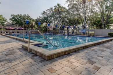 PRICED TO SELL!   This FIRST FLOOR condo located in desirable on East Lake Woodlands Country Club in Florida - for sale on GolfHomes.com, golf home, golf lot
