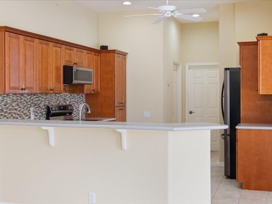 Presenting an exceptional, one-owner residence that has been on Pelican Pointe Golf and Country Club in Florida - for sale on GolfHomes.com, golf home, golf lot