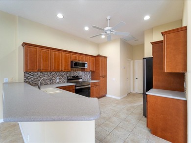 Presenting an exceptional, one-owner residence that has been on Pelican Pointe Golf and Country Club in Florida - for sale on GolfHomes.com, golf home, golf lot