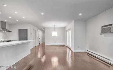 Experience modern elegance in this stunning top-floor condo on Pine Brook Golf Course in New Jersey - for sale on GolfHomes.com, golf home, golf lot
