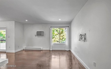 Experience modern elegance in this stunning top-floor condo on Pine Brook Golf Course in New Jersey - for sale on GolfHomes.com, golf home, golf lot