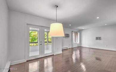 Experience modern elegance in this stunning top-floor condo on Pine Brook Golf Course in New Jersey - for sale on GolfHomes.com, golf home, golf lot