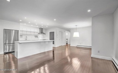 Experience modern elegance in this stunning top-floor condo on Pine Brook Golf Course in New Jersey - for sale on GolfHomes.com, golf home, golf lot