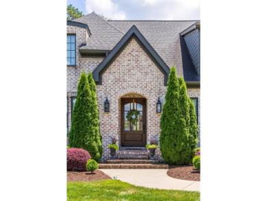 Step into timeless elegance with this exquisite Waters-Holland on The Champions Club At Hampton Creek in Tennessee - for sale on GolfHomes.com, golf home, golf lot