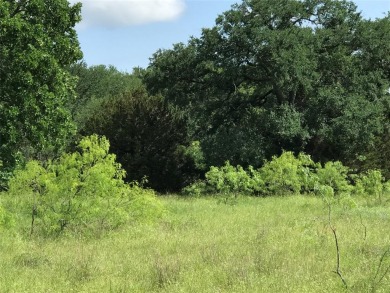 Nearly 1 AC sitting across from the Old Course Driving Range and on White Bluff Resort - Old Course in Texas - for sale on GolfHomes.com, golf home, golf lot