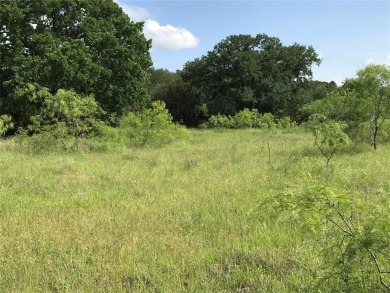 Nearly 1 AC sitting across from the Old Course Driving Range and on White Bluff Resort - Old Course in Texas - for sale on GolfHomes.com, golf home, golf lot