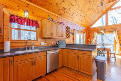 Charming Log Cabin Retreat in Bryson City -Nestled in the heart on Smoky Mountain Country Club in North Carolina - for sale on GolfHomes.com, golf home, golf lot