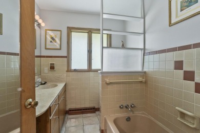 Mid Century sprawling home offers so many spaces to entertain on Urbana Golf and Country Club in Illinois - for sale on GolfHomes.com, golf home, golf lot