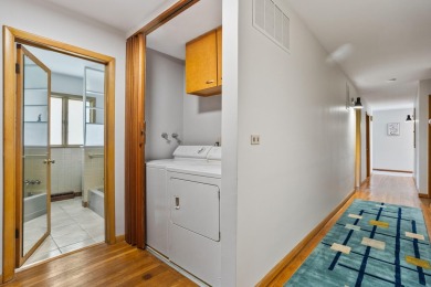 Mid Century sprawling home offers so many spaces to entertain on Urbana Golf and Country Club in Illinois - for sale on GolfHomes.com, golf home, golf lot