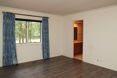Very nice home on Coronado Golf Course overlooking the 11th on Coronado Golf Course in Arkansas - for sale on GolfHomes.com, golf home, golf lot