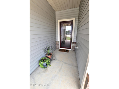 Welcome Home to a charming Villa tucked away in the cul-de-sac on The Golf Club At Rocky Mount in North Carolina - for sale on GolfHomes.com, golf home, golf lot