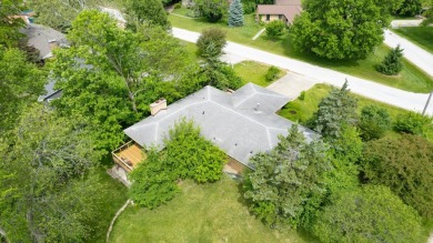 Mid Century sprawling home offers so many spaces to entertain on Urbana Golf and Country Club in Illinois - for sale on GolfHomes.com, golf home, golf lot