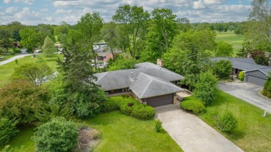 Mid Century sprawling home offers so many spaces to entertain on Urbana Golf and Country Club in Illinois - for sale on GolfHomes.com, golf home, golf lot