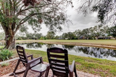 MUST SEE EAST LAKE WOODLANDS TREASURE! A LOVELY WATERFRONT, 4 on East Lake Woodlands Country Club in Florida - for sale on GolfHomes.com, golf home, golf lot