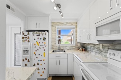 Bright and open 1/1 condo in Phase 3 of Sunrise Lakes community on Sunrise Lakes Phase III in Florida - for sale on GolfHomes.com, golf home, golf lot