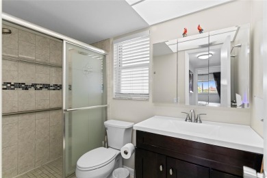 Bright and open 1/1 condo in Phase 3 of Sunrise Lakes community on Sunrise Lakes Phase III in Florida - for sale on GolfHomes.com, golf home, golf lot