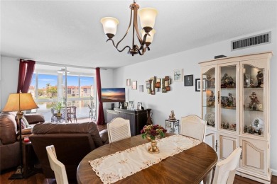 Bright and open 1/1 condo in Phase 3 of Sunrise Lakes community on Sunrise Lakes Phase III in Florida - for sale on GolfHomes.com, golf home, golf lot