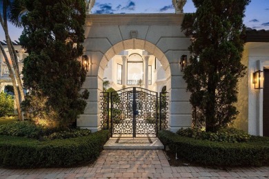 Experience breathtaking long lake views from this grand estate on St. Andrews Country Club of Boca Raton in Florida - for sale on GolfHomes.com, golf home, golf lot