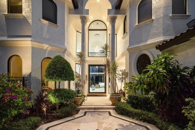 Experience breathtaking long lake views from this grand estate on St. Andrews Country Club of Boca Raton in Florida - for sale on GolfHomes.com, golf home, golf lot