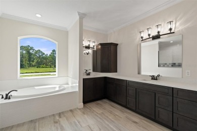 Don't miss your chance to own this exquisite, custom-built new on Harmony Golf Preserve in Florida - for sale on GolfHomes.com, golf home, golf lot