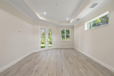 Don't miss your chance to own this exquisite, custom-built new on Harmony Golf Preserve in Florida - for sale on GolfHomes.com, golf home, golf lot