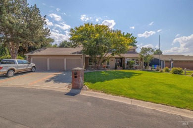 Nestled in a serene cul-de-sac, this 5-bedroom, 3-bathroom on Lewiston Golf and Country Club in Idaho - for sale on GolfHomes.com, golf home, golf lot