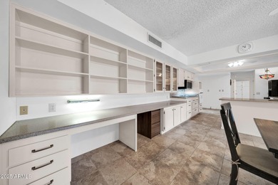 This unique 3 bedroom, 3 bath North/South facing home in Sun on Union Hills Country Club in Arizona - for sale on GolfHomes.com, golf home, golf lot