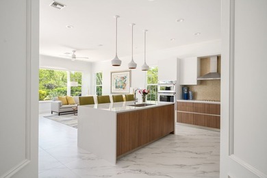 Luxurious Bermuda designed exterior & spacious modern interior on Grand Harbor Golf and Country Club in Florida - for sale on GolfHomes.com, golf home, golf lot