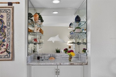 FURNISHED! TOP FLOOR UPDATED 2 BEDROOM, 2 BATH CONDO IN THE on Kingsway Country Club in Florida - for sale on GolfHomes.com, golf home, golf lot