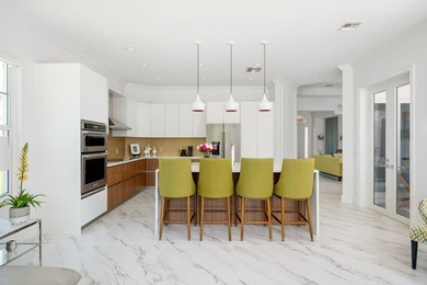 Luxurious Bermuda designed exterior & spacious modern interior on Grand Harbor Golf and Country Club in Florida - for sale on GolfHomes.com, golf home, golf lot