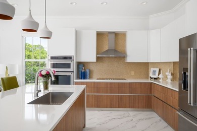 Luxurious Bermuda designed exterior & spacious modern interior on Grand Harbor Golf and Country Club in Florida - for sale on GolfHomes.com, golf home, golf lot