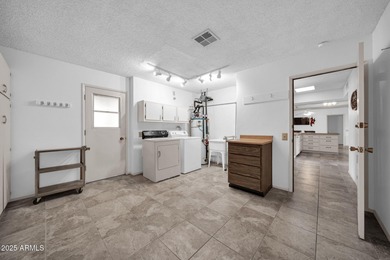 This unique 3 bedroom, 3 bath North/South facing home in Sun on Union Hills Country Club in Arizona - for sale on GolfHomes.com, golf home, golf lot