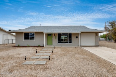 This Sun City stunner has been completely transformed from top on Sun City North Golf Course in Arizona - for sale on GolfHomes.com, golf home, golf lot