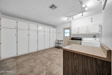 This unique 3 bedroom, 3 bath North/South facing home in Sun on Union Hills Country Club in Arizona - for sale on GolfHomes.com, golf home, golf lot