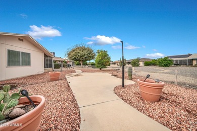 This unique 3 bedroom, 3 bath North/South facing home in Sun on Union Hills Country Club in Arizona - for sale on GolfHomes.com, golf home, golf lot