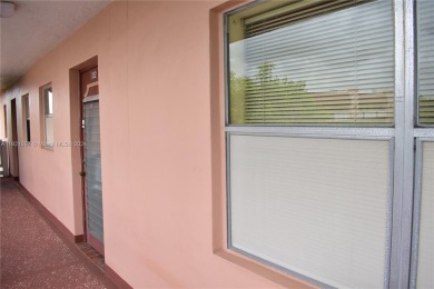This furnished, turnkey, top floor condo features all new on Sunrise Lakes Phase III in Florida - for sale on GolfHomes.com, golf home, golf lot