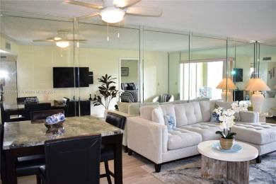 This furnished, turnkey, top floor condo features all new on Sunrise Lakes Phase III in Florida - for sale on GolfHomes.com, golf home, golf lot