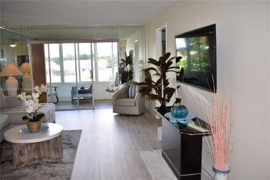 This furnished, turnkey, top floor condo features all new on Sunrise Lakes Phase III in Florida - for sale on GolfHomes.com, golf home, golf lot