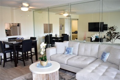 This furnished, turnkey, top floor condo features all new on Sunrise Lakes Phase III in Florida - for sale on GolfHomes.com, golf home, golf lot