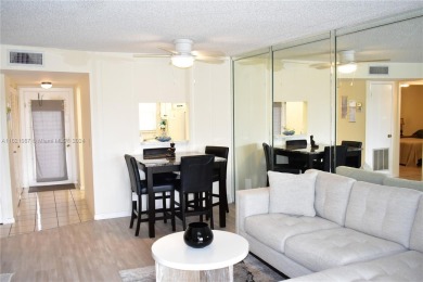 This furnished, turnkey, top floor condo features all new on Sunrise Lakes Phase III in Florida - for sale on GolfHomes.com, golf home, golf lot