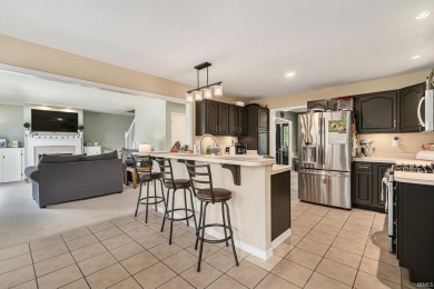 Spacious 5-Bedroom Home with Golf Course Views in Larimer Greens on Black Squirrel Golf Club in Indiana - for sale on GolfHomes.com, golf home, golf lot