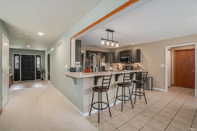 Spacious 5-Bedroom Home with Golf Course Views in Larimer Greens on Black Squirrel Golf Club in Indiana - for sale on GolfHomes.com, golf home, golf lot