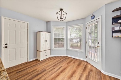 Tucked at the end of a quiet cul-de-sac and backing up to on Canongate At Eagle Watch Golf Club in Georgia - for sale on GolfHomes.com, golf home, golf lot